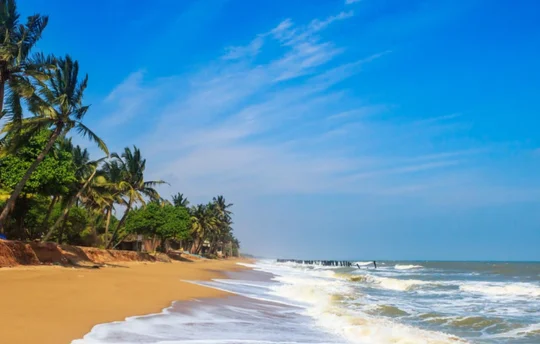 Auroville Beach, offers golden sands, tranquil waves, and serene sunrise views, perfect for a retreat