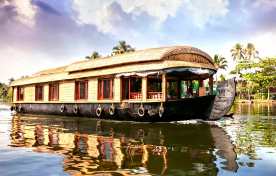 Chunnambar Boat House offers serene rides and lush surroundings, perfect for a relaxing getaway.