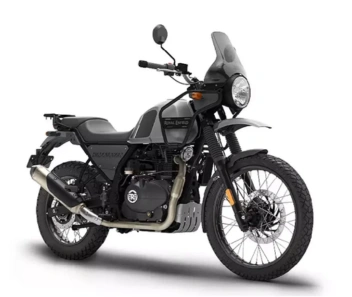 A black motorcycle is the perfect blend of power and versatility, ready for off-road adventures.