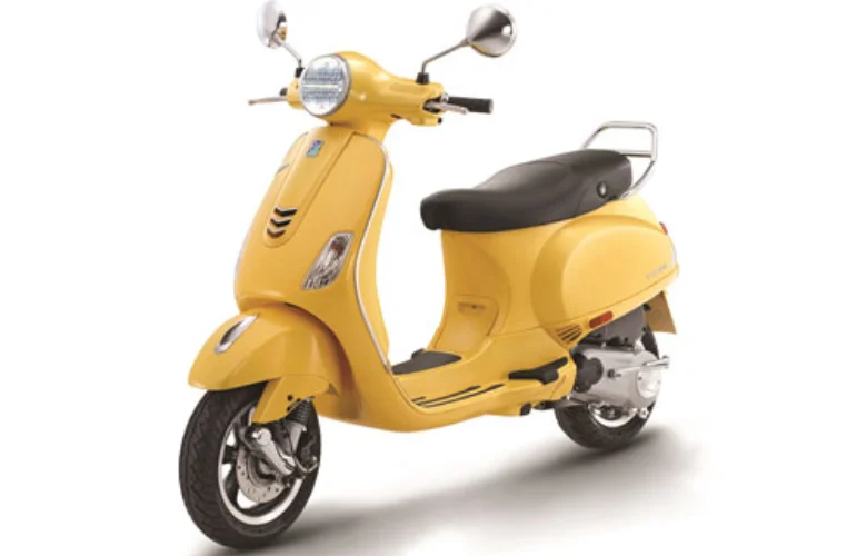 Vibrant yellow Vespa scooters contrast elegantly, striking the perfect mix of style and usefulness.